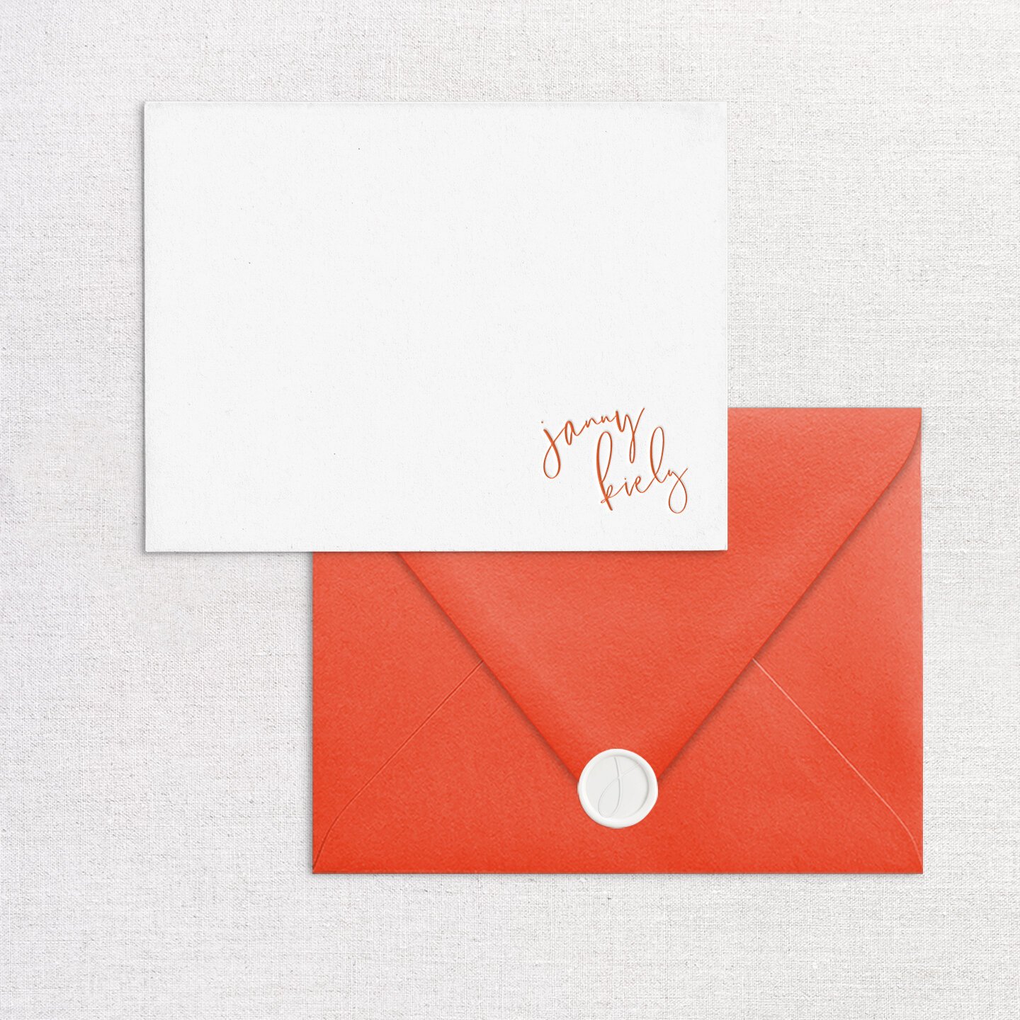 Personalized script card with a coral envelope and wax seal